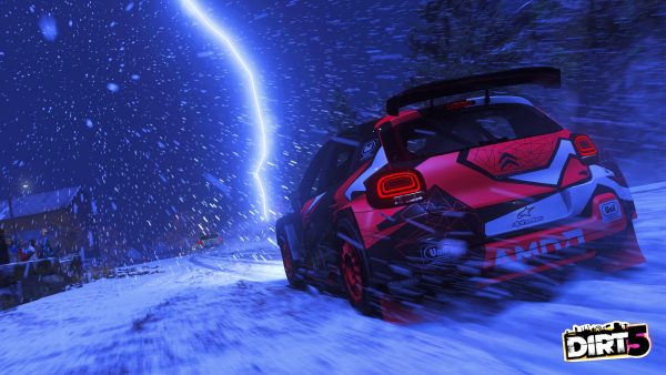 Dirt 5 screen shot night time driving in the ice and snow.
